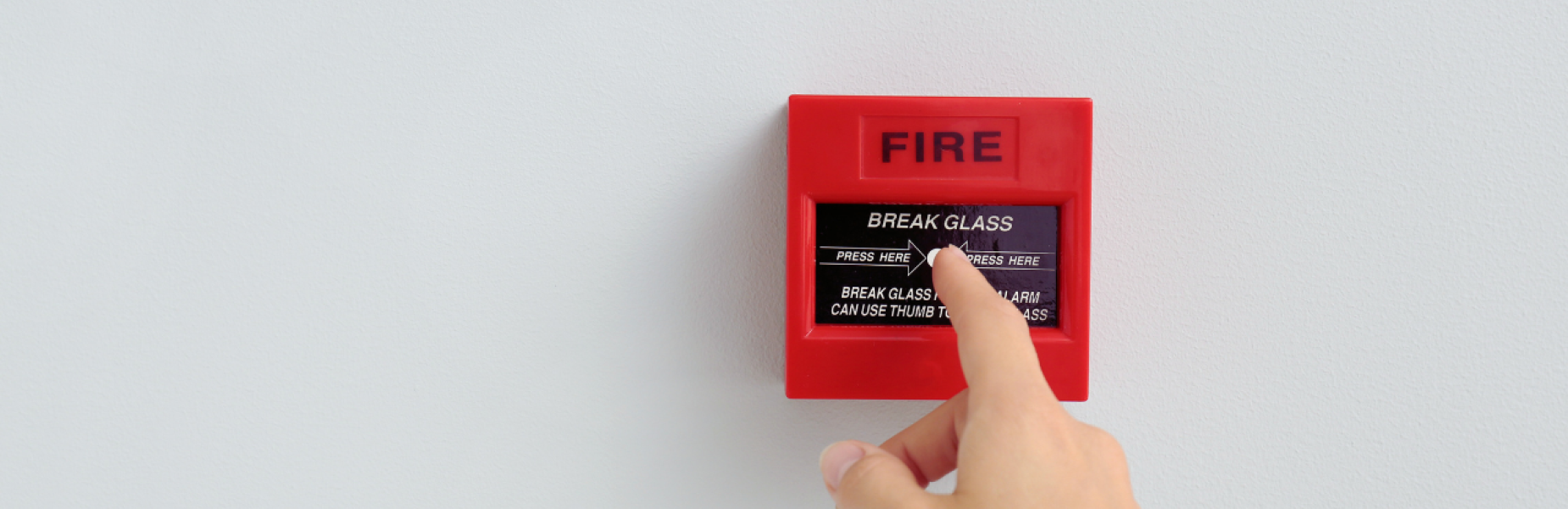 Fire alarm on a white wall