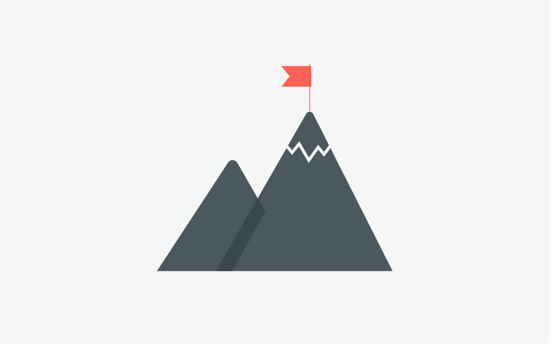 Image of two mountains with a flag