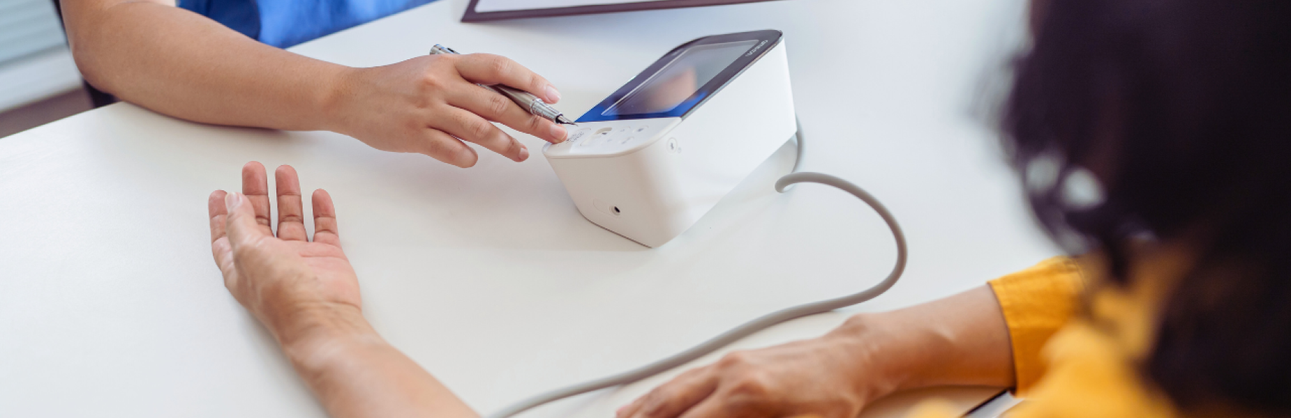 picture of a patient having a blood-pressure check