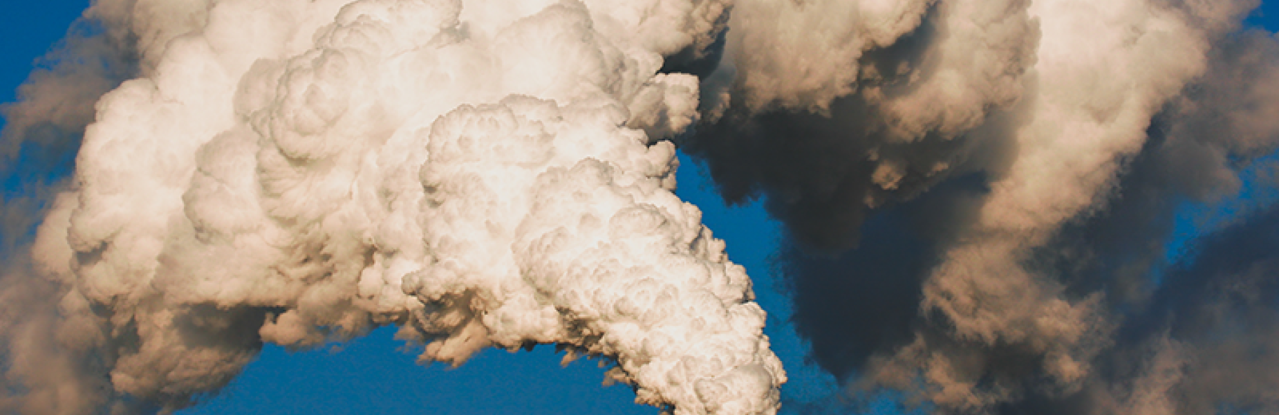 Industrial chimney with smoke coming out