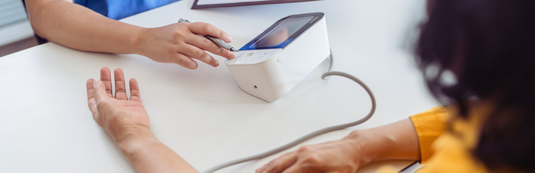 patient having their blood pressure taken